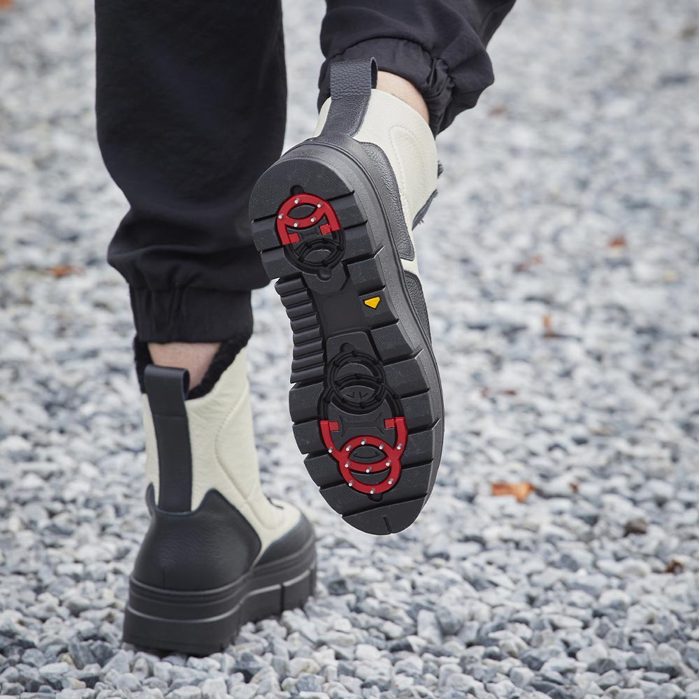 Blizzard: Black & Cream Leather & Shearling Boots Sole Bliss