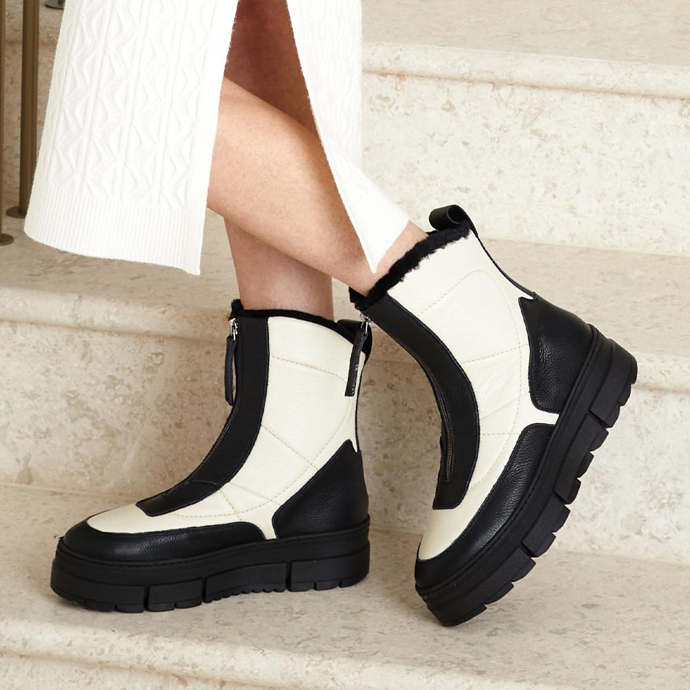 Blizzard: Black & Cream Leather & Shearling Boots Sole Bliss