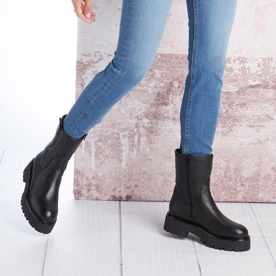 Reign: Black Leather Boots Sole Bliss